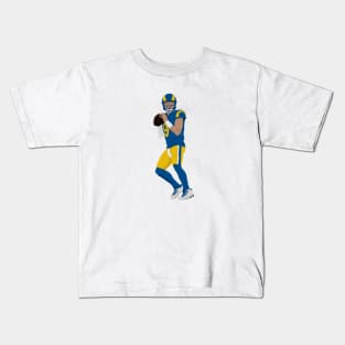 Football player in action Kids T-Shirt